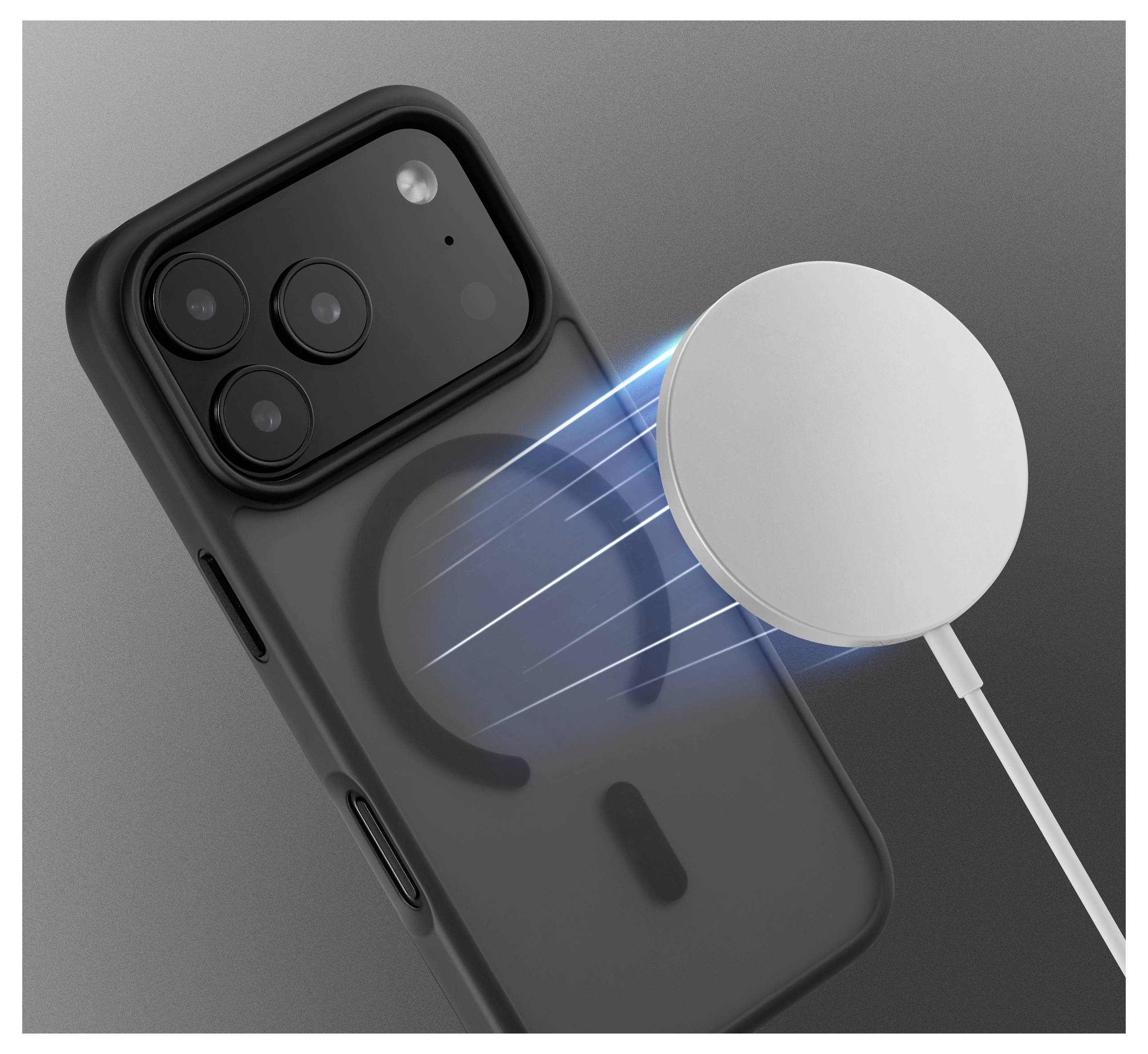 A black smartphone with a highlighted ring on the back, positioned next to a circular wireless charger emitting blue light.