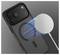 A smartphone with a black case is shown from the back. A wireless charging device is aligned, with blue light beams indicating connectivity.