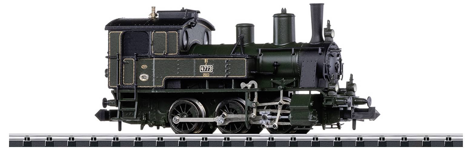 Model of an old steam locomotive in dark green with black and gold details, standing on a section of track.