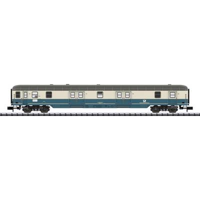 A two-tone model railway carriage, partly beige, partly turquoise. It displays numerous windows and detailed chassis.