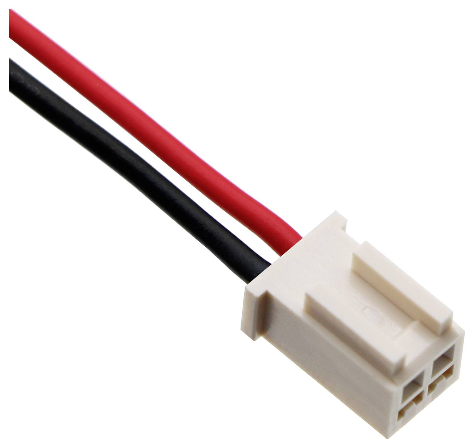 Close-up of a white connector with two cables, one red and one black, leading out from the back.