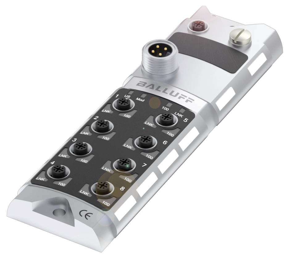 A gray industrial connector with multiple black connection sockets and a round metal plug, brand name 'Balluff'.