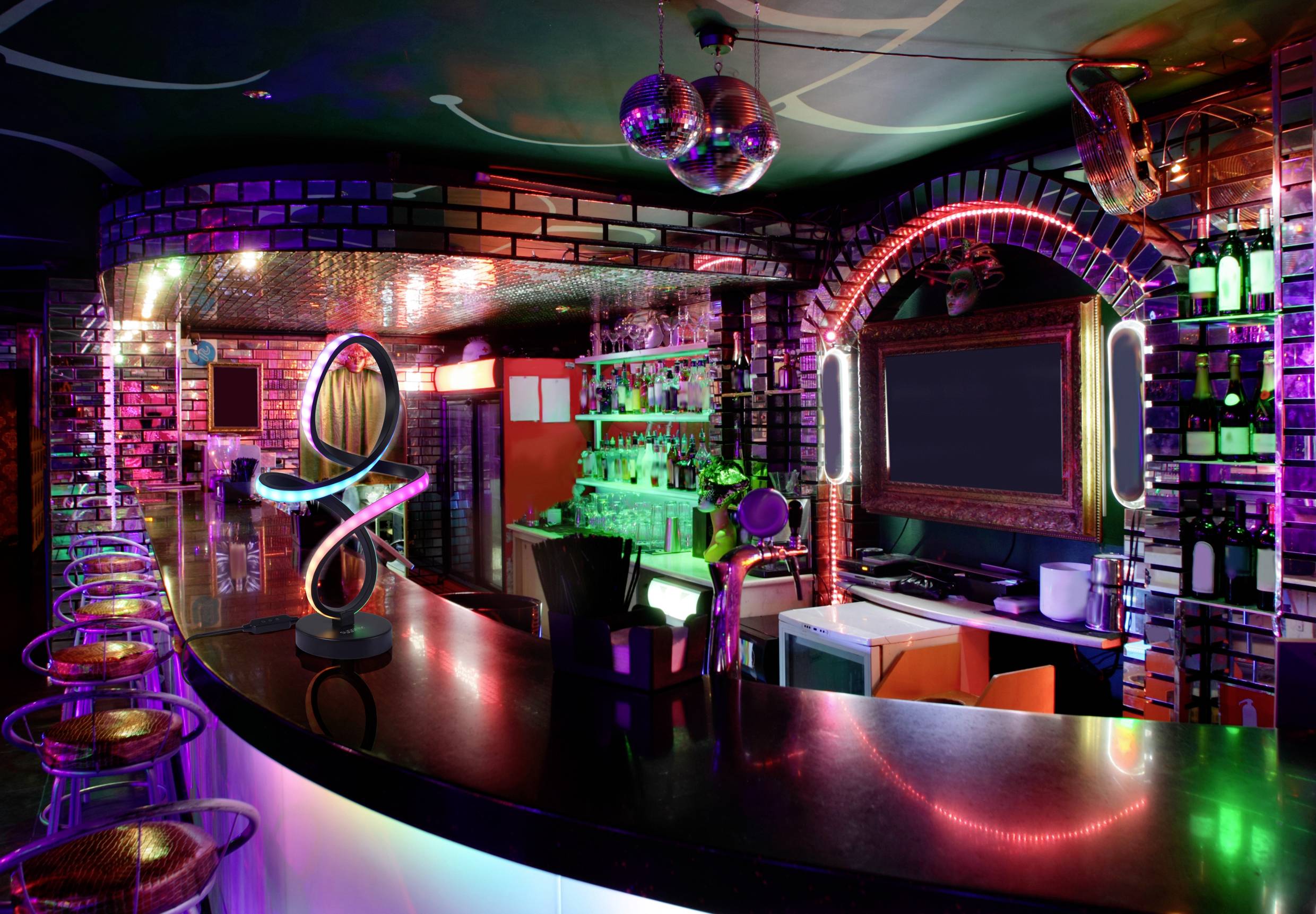 A vibrant nightclub with colorful neon lights, a glossy bar with high stools, a large mirror, and shelves stocked with bottles in a lively setting.