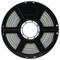 A black spool of 3D printer filament with multicolored strands including green, pink, and blue, neatly wound inside.