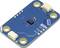 A blue sensor board with multiple connectors and a central chip, labels 'GND', 'SDA', 'SCL'.