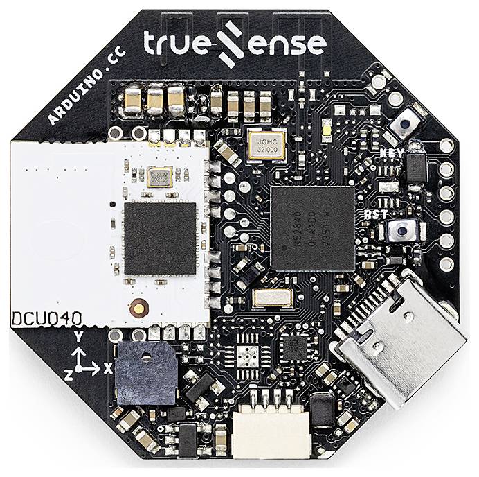 'Octagonal Arduino circuit board with chip, USB port and multiple electronic components. Axis markings for X, Y, Z visible.'