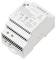 'A white power supply unit labeled with model, voltage, and output details, featuring symbols for safety certifications and mounting design.'