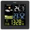 Black weather station shows forecast with sun, current outdoor temperature 24.6°C, indoor 23°C, 52% humidity and time 13:28.