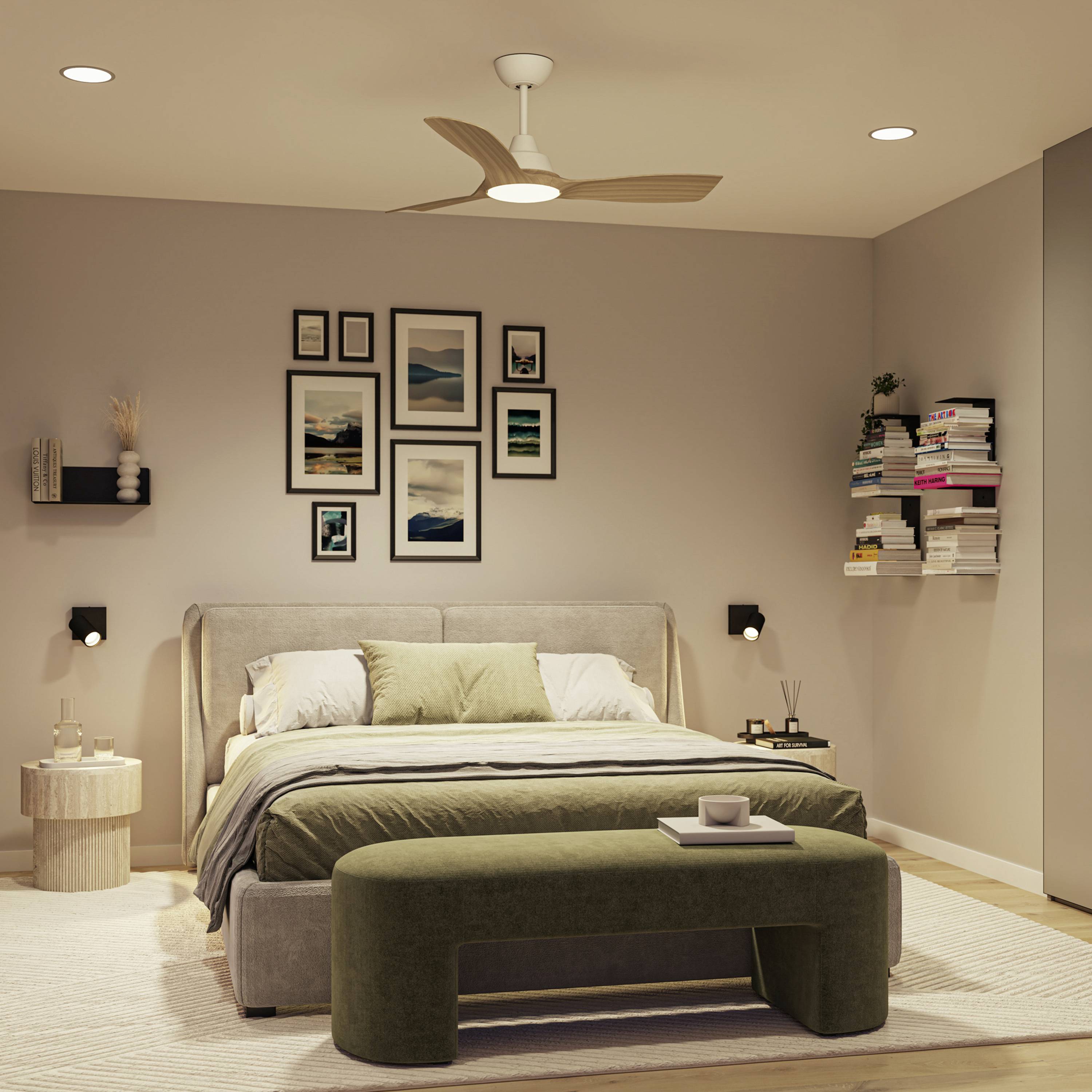 A cozy bedroom with a large bed in the center, surrounded by pictures on the wall, a bookshelf, and nightstands.