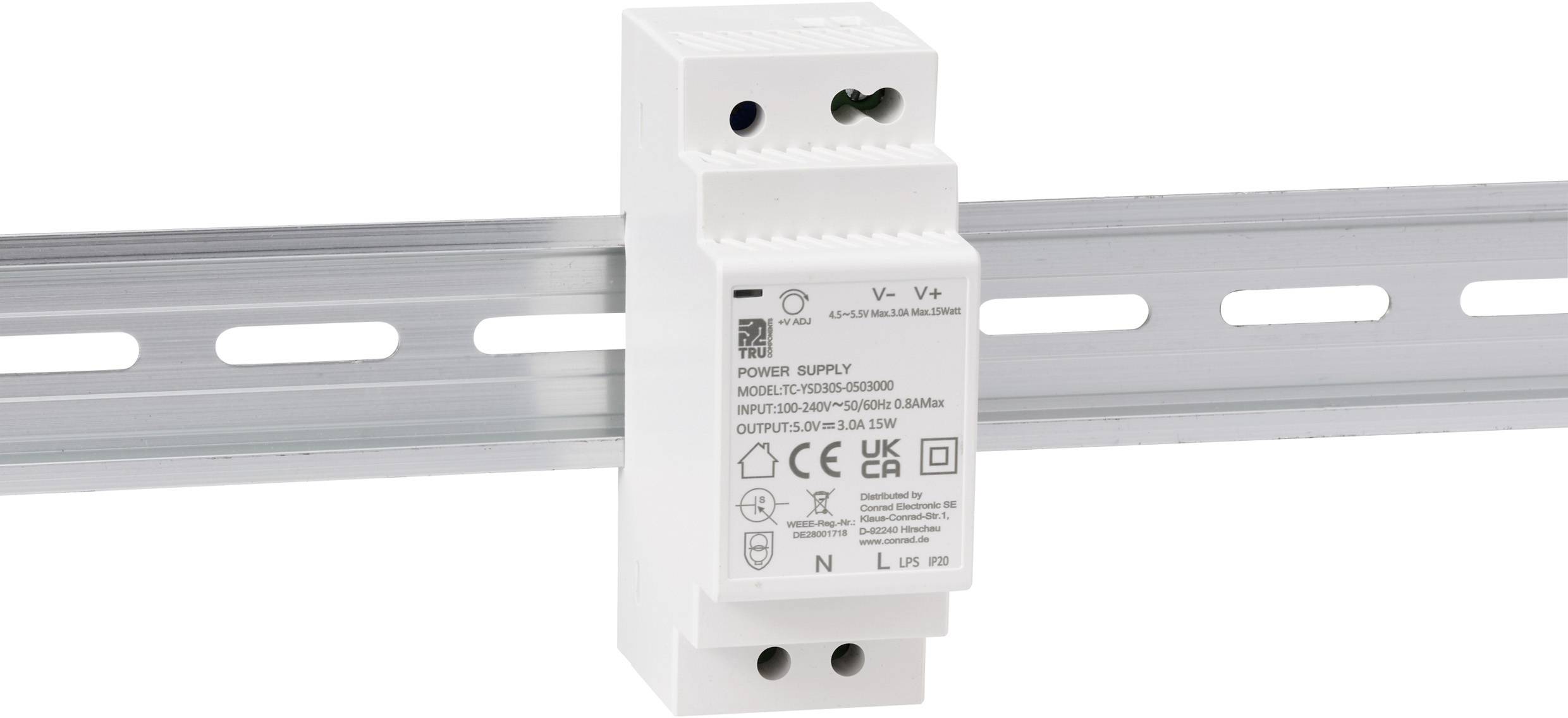 'White power supply mounted on a metal DIN rail, featuring various certification symbols, and specifications on the front label.'