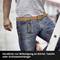 Man wearing jeans with a carabiner on his belt that holds a small pouch. Text on pouch: 'E-Titan'.