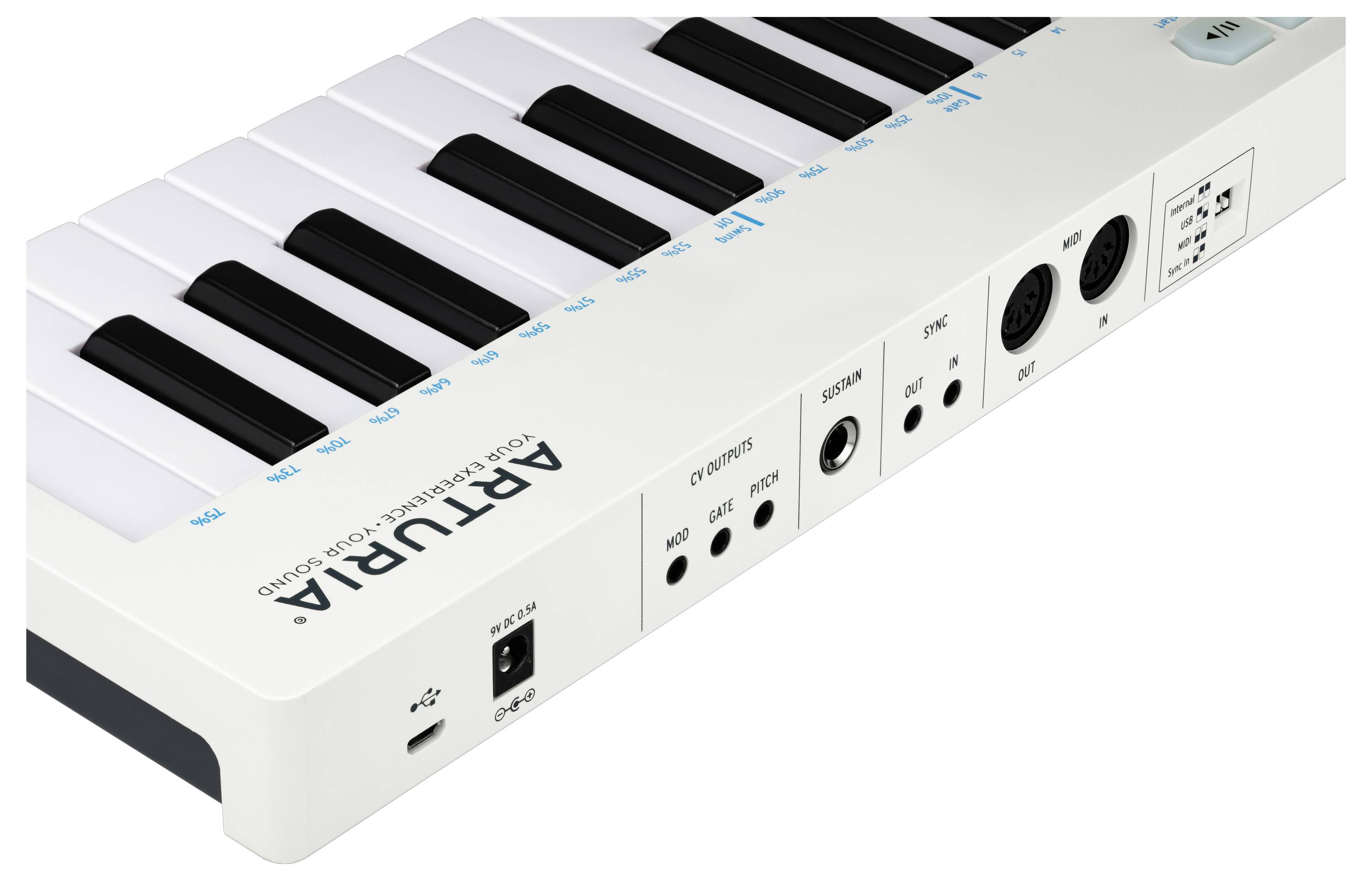 A white MIDI keyboard with black keys, USB and MIDI connections. Brand name 'Arturia' visible on the side.