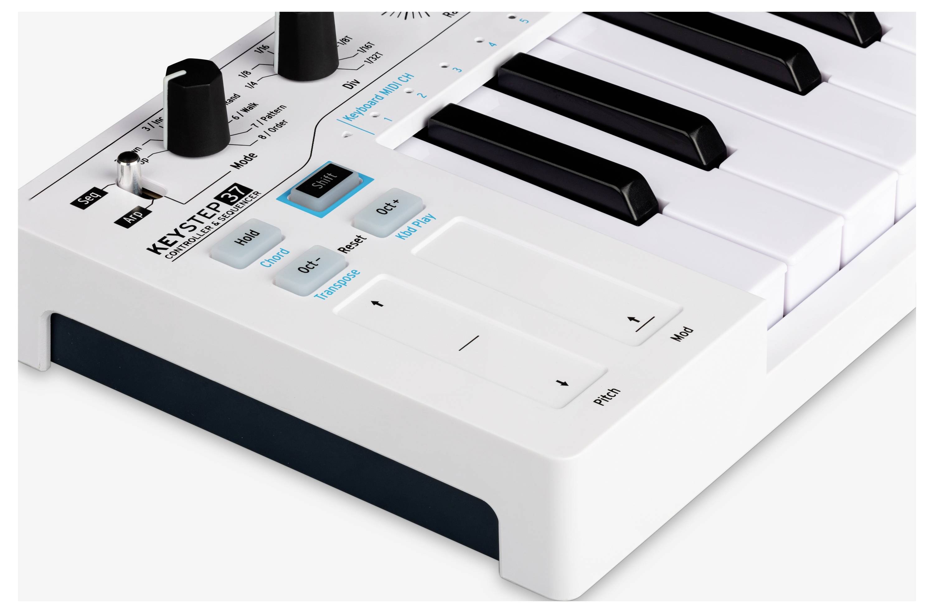White MIDI controller keyboard with black keys, rotary knobs and blue buttons for controlling music parameters.