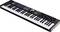 A MIDI controller keyboard with 49 keys, rotary knobs, pads, and a display. Ideal for music production and live performance.