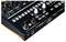 A music DJ controller with various sliders, knobs and connections, used for mixing and editing audio.