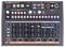 Drum machine with multiple knobs and buttons for controlling rhythm, sound and volume. LCD display shows '120'.
