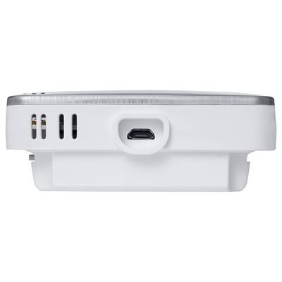 A white electronic device with USB port and ventilation slots, possibly a projector or similar hardware.