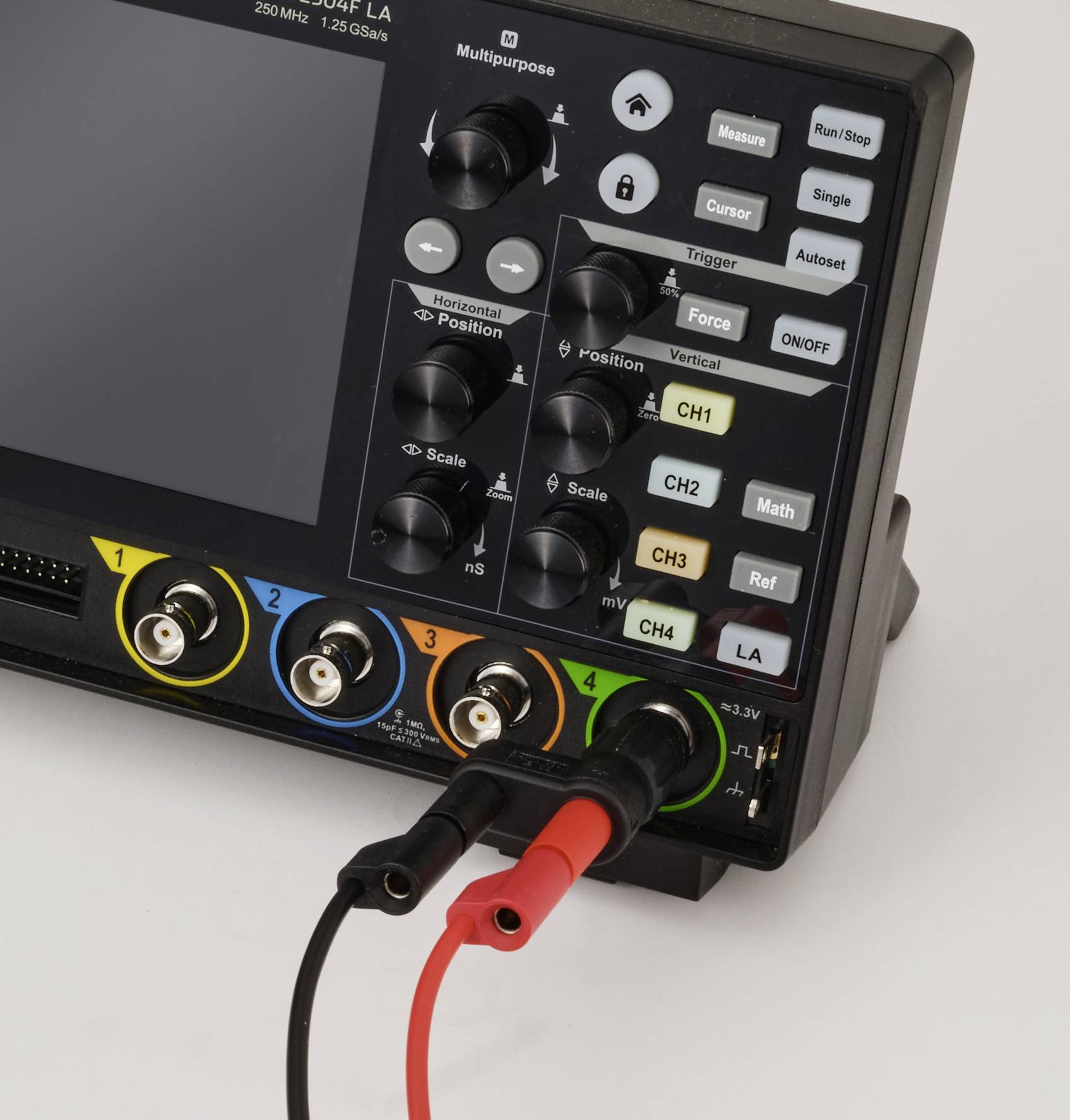 'A digital oscilloscope displaying various control knobs and inputs. Colored ports labeled CH1 to CH4 for signal connections.'