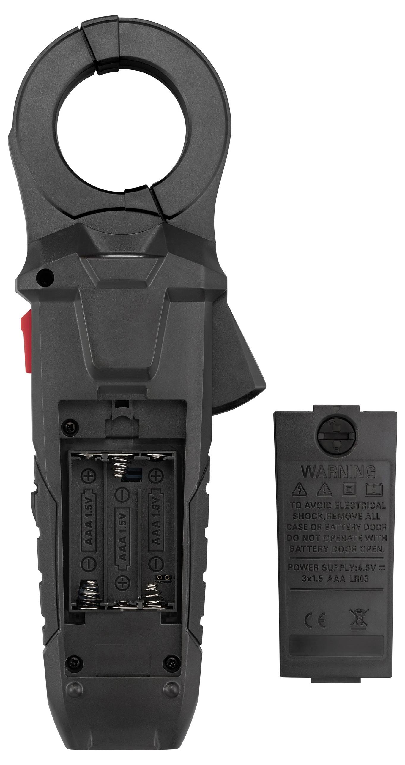 A handheld electrical clamp meter with an open battery compartment next to its cover.