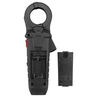 A handheld electrical clamp meter with an open battery compartment next to its cover.