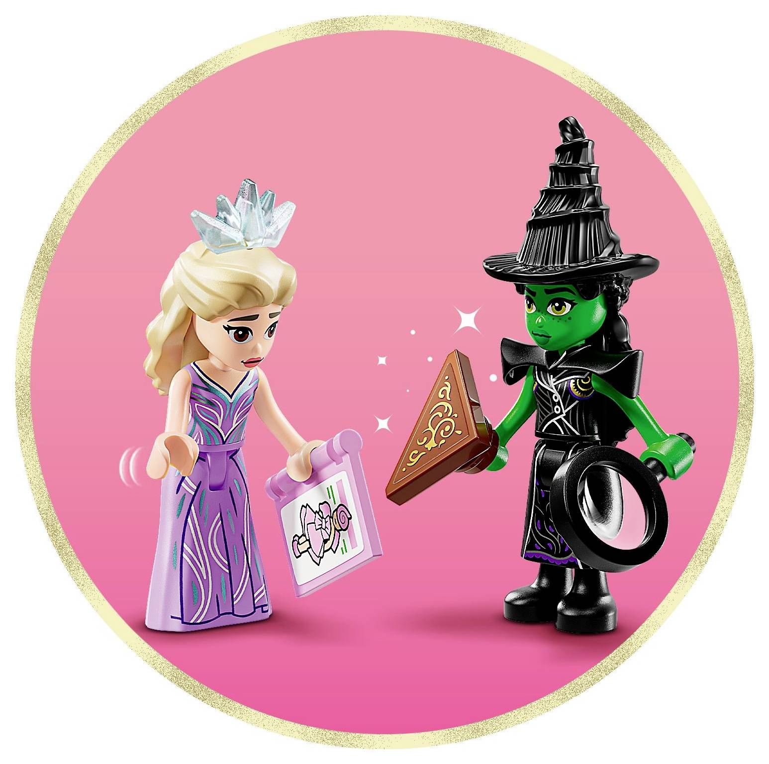 A blonde princess in a pink dress holds a drawing, facing a green-skinned witch in a black hat, both made of toy bricks on a pink background.