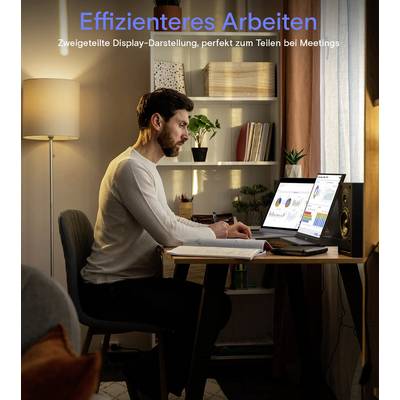 A man works at a desk with dual laptop screens displaying charts, set in a cozy room. Text in German promotes efficient work sharing.