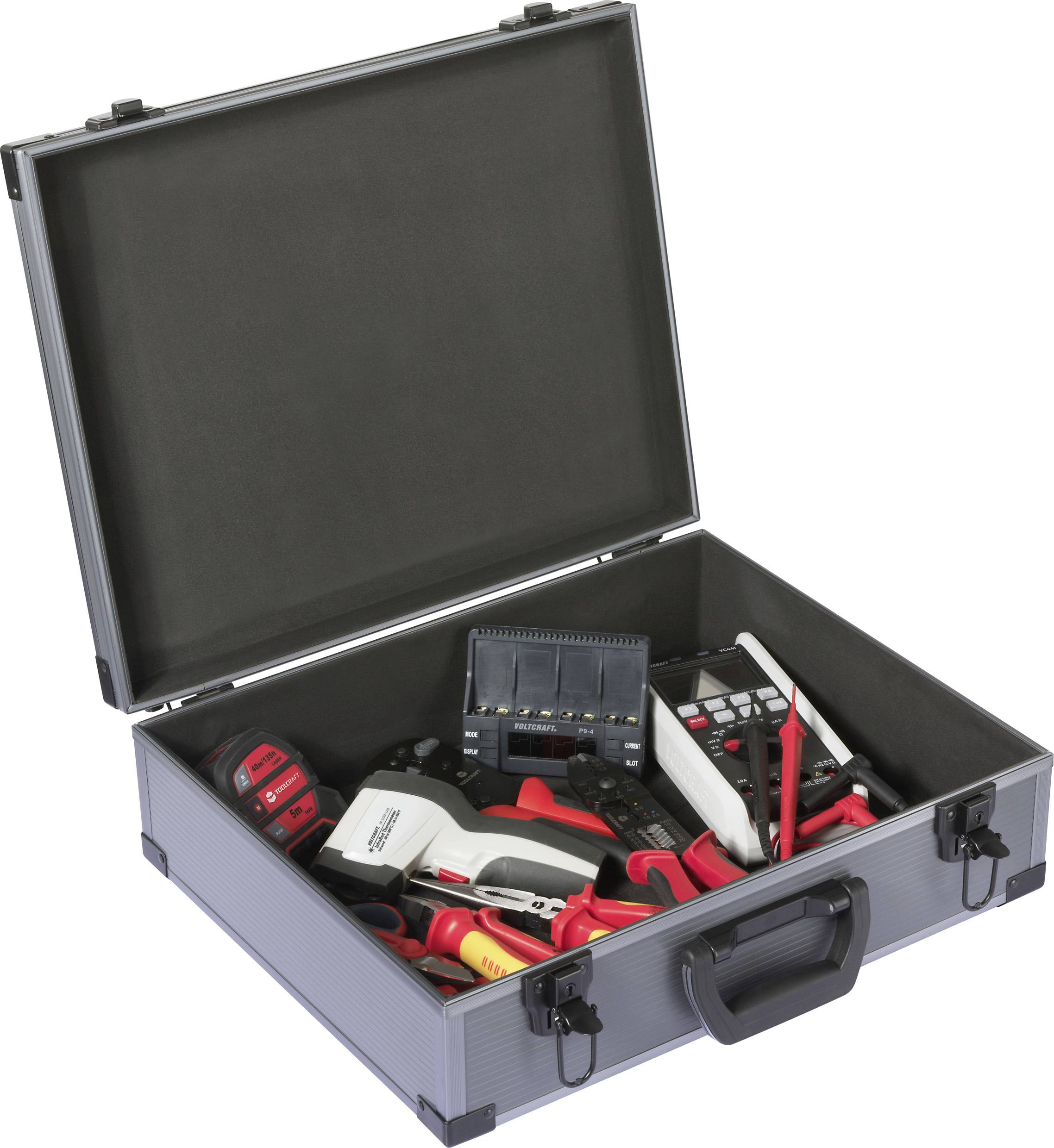 An open tool case containing various tools such as screwdrivers, pliers, and measuring devices, organized for electrical work.