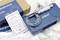 Blue micrometer, warranty letter, and certificates on a table with Dasqua branded packaging.