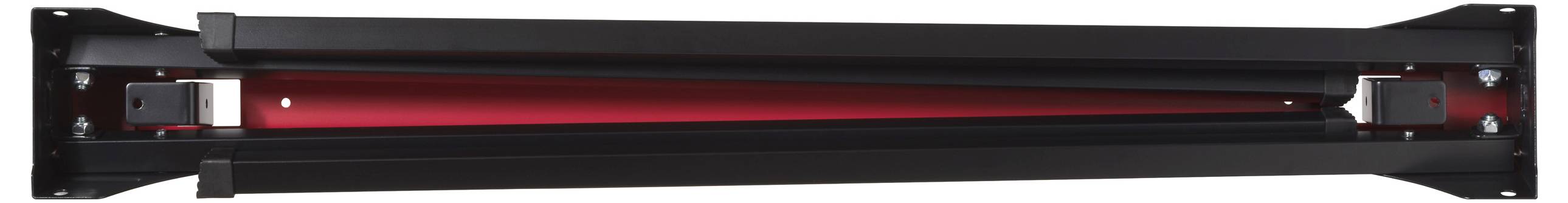 A black and red infrared heating lamp with a sleek, elongated design is mounted on a wall.