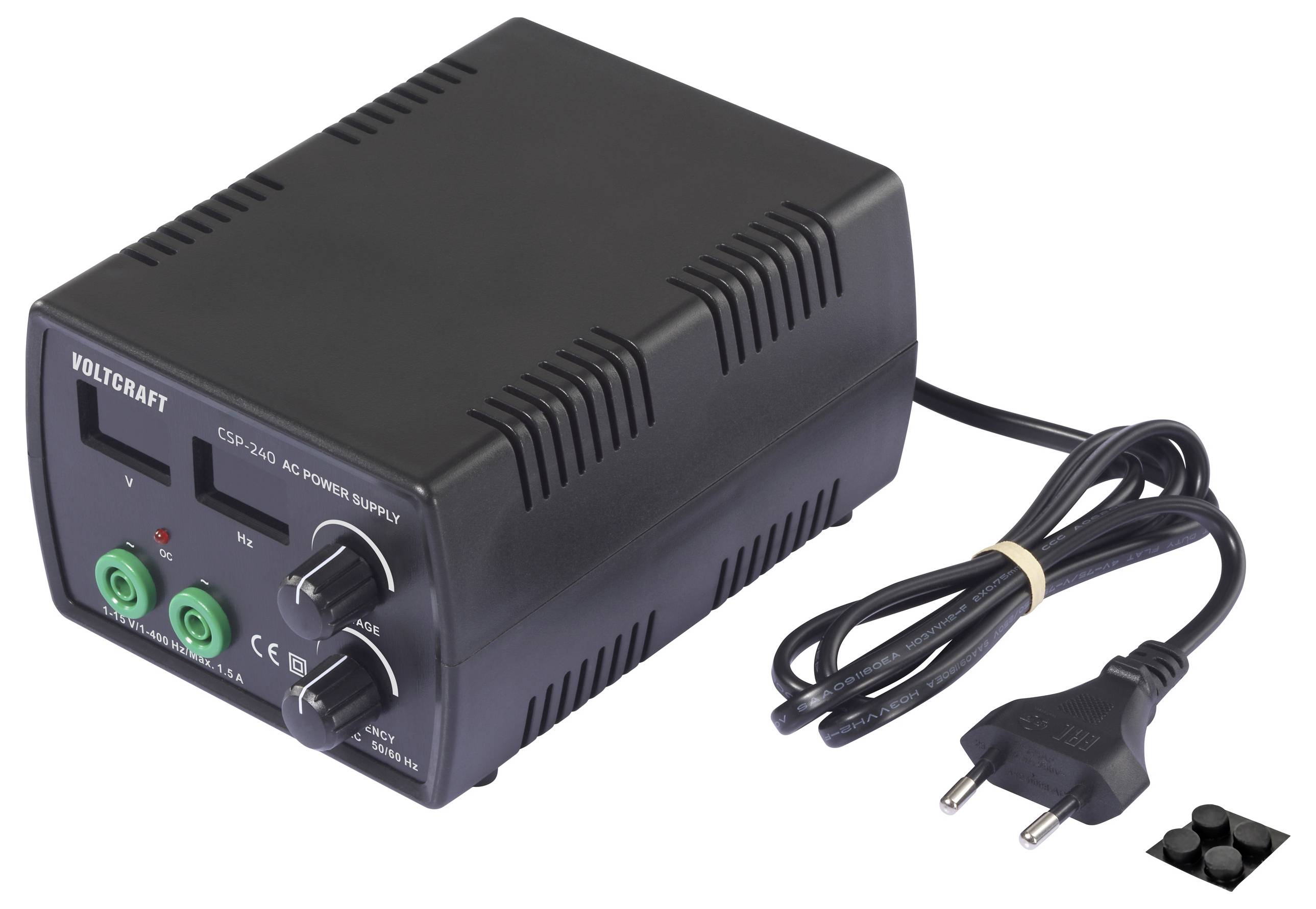 'Voltcraft' branded black AC power supply unit with two green knobs for voltage adjustment, two sockets, and a European plug.