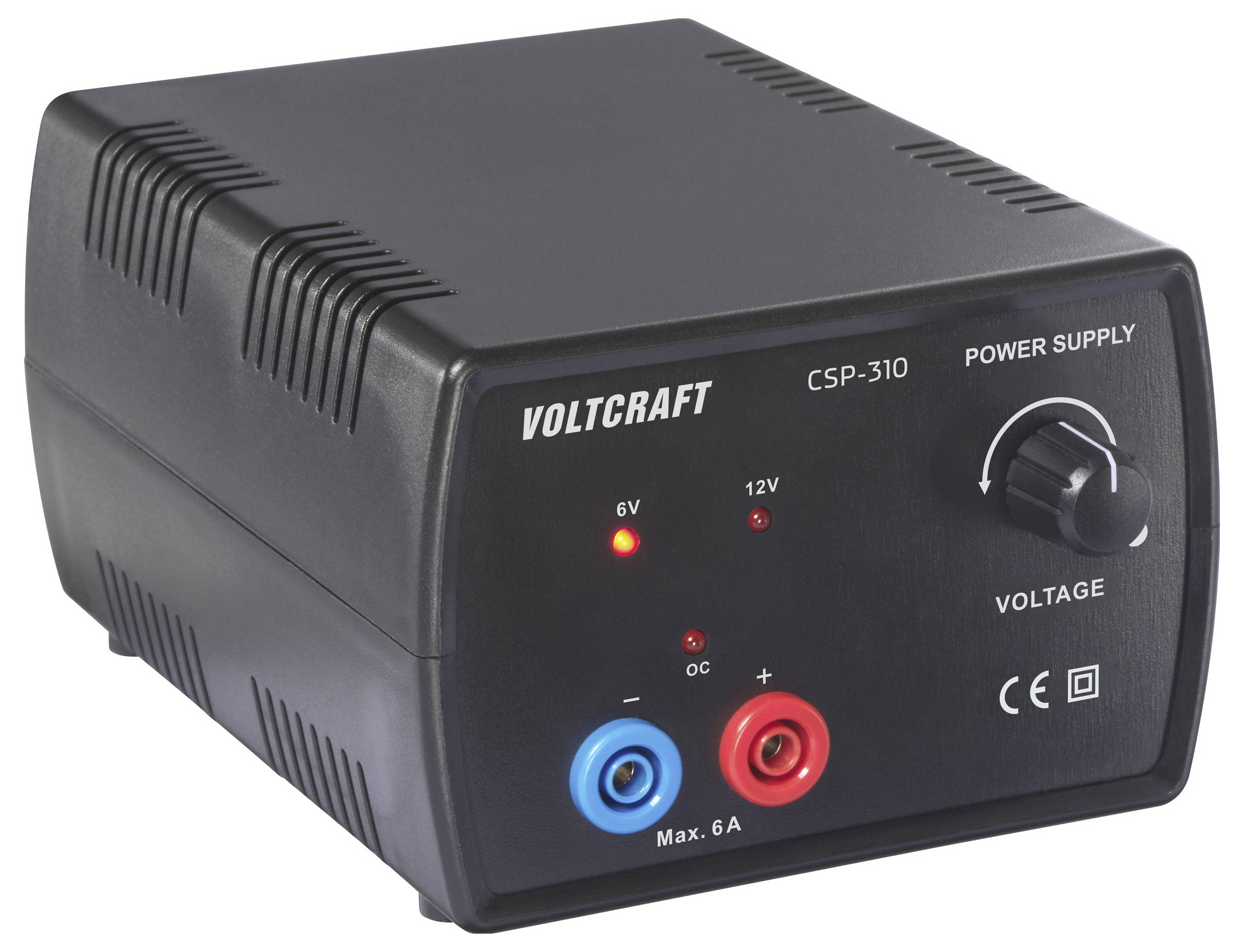 A black Voltcraft CSP-310 power supply unit with voltage dial, 6V and 12V settings, red and blue output sockets, and a power indicator.