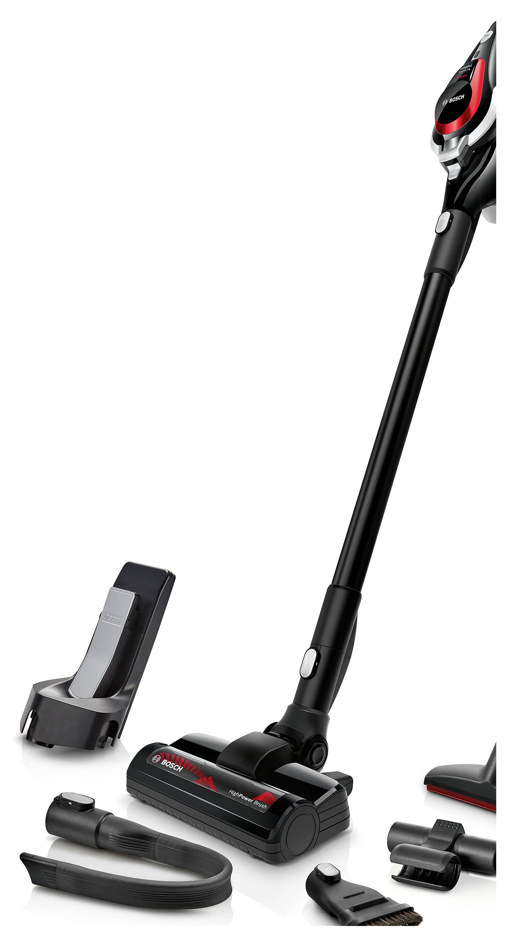 Cordless vacuum with a slim design shown upright, alongside various attachments and a charging stand, on a white background.