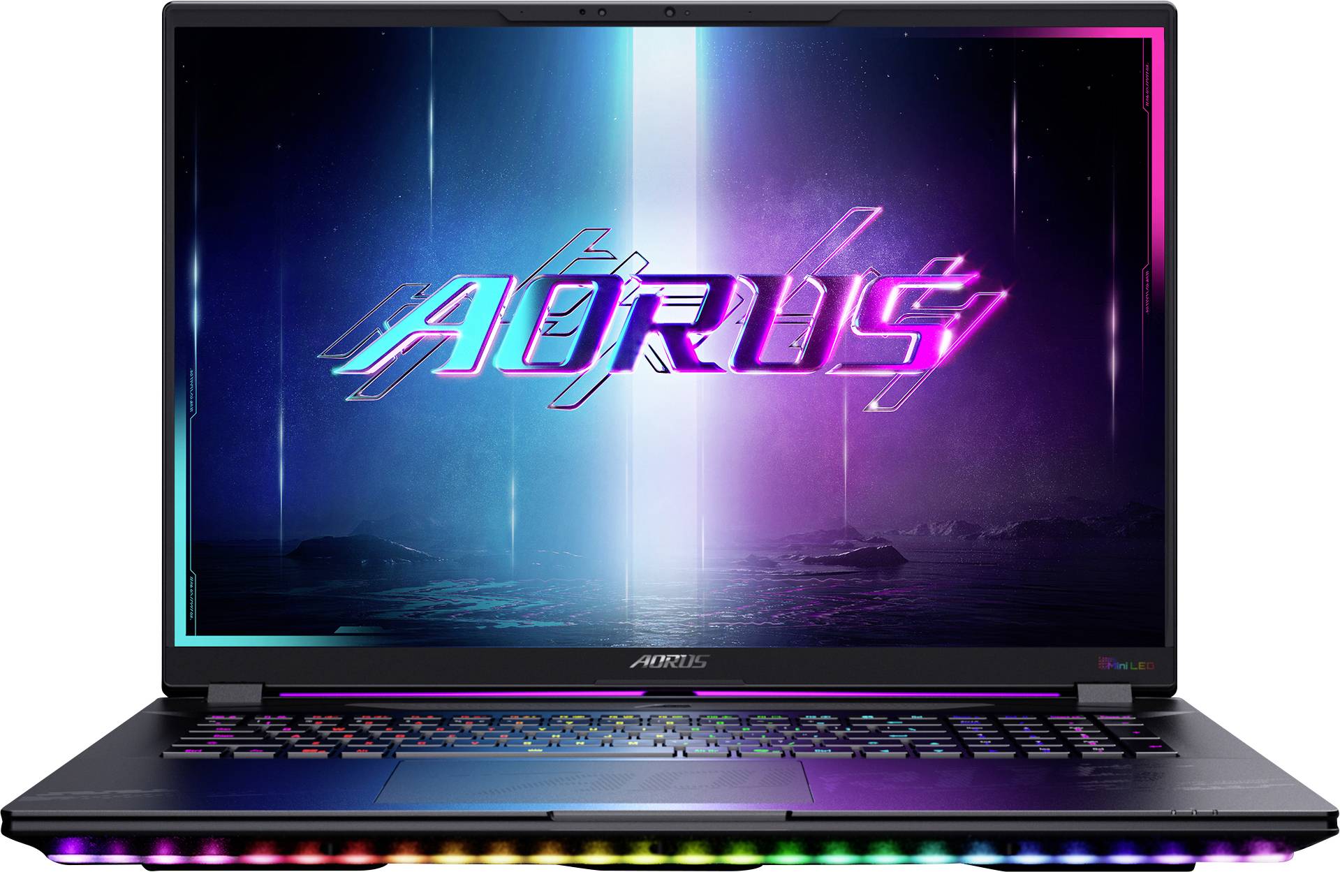 A laptop with a colorful LED-lit keyboard displays a vibrant screen featuring the logo 'AORUS' against a neon background.