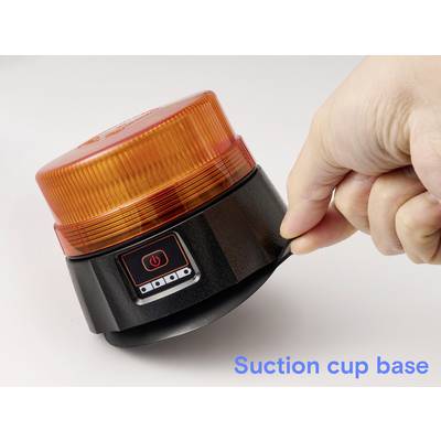 A hand pulling a suction cup base of an orange emergency light. The light features an on/off button on a black casing.
