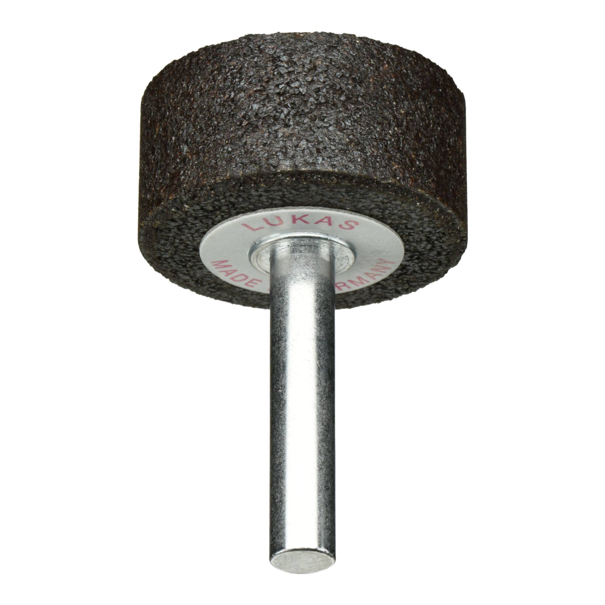 A cylindrical abrasive grinding wheel attached to a metal rod, labeled 'Lukas,' used for polishing or shaping materials.