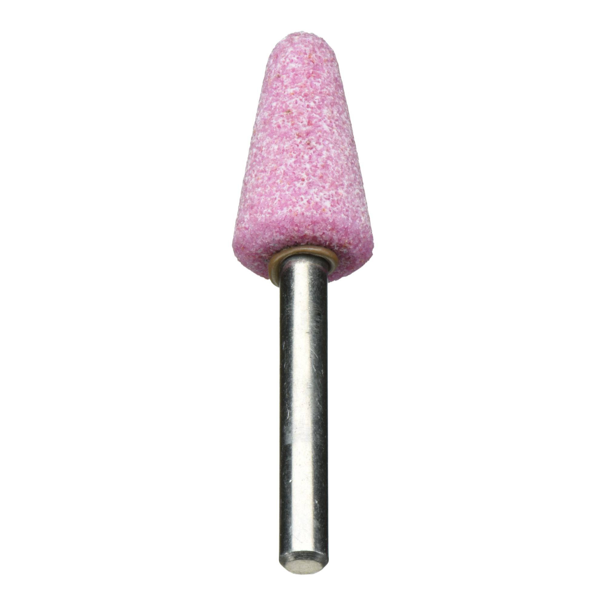A pink cylindrical grinding stone with a metal shank, typically used for sharpening, deburring, or surface finishing in workshops.