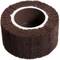 A cylindrical brown abrasive wheel with a circular opening in the center, used for surface finishing in industrial applications.