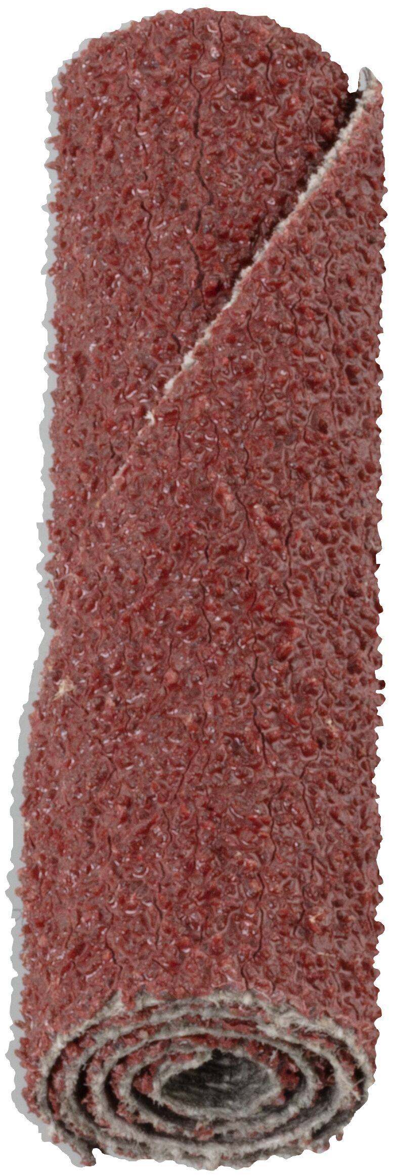 A roll of red sandpaper, tightly coiled, showing its coarse, textured surface suitable for sanding surfaces.