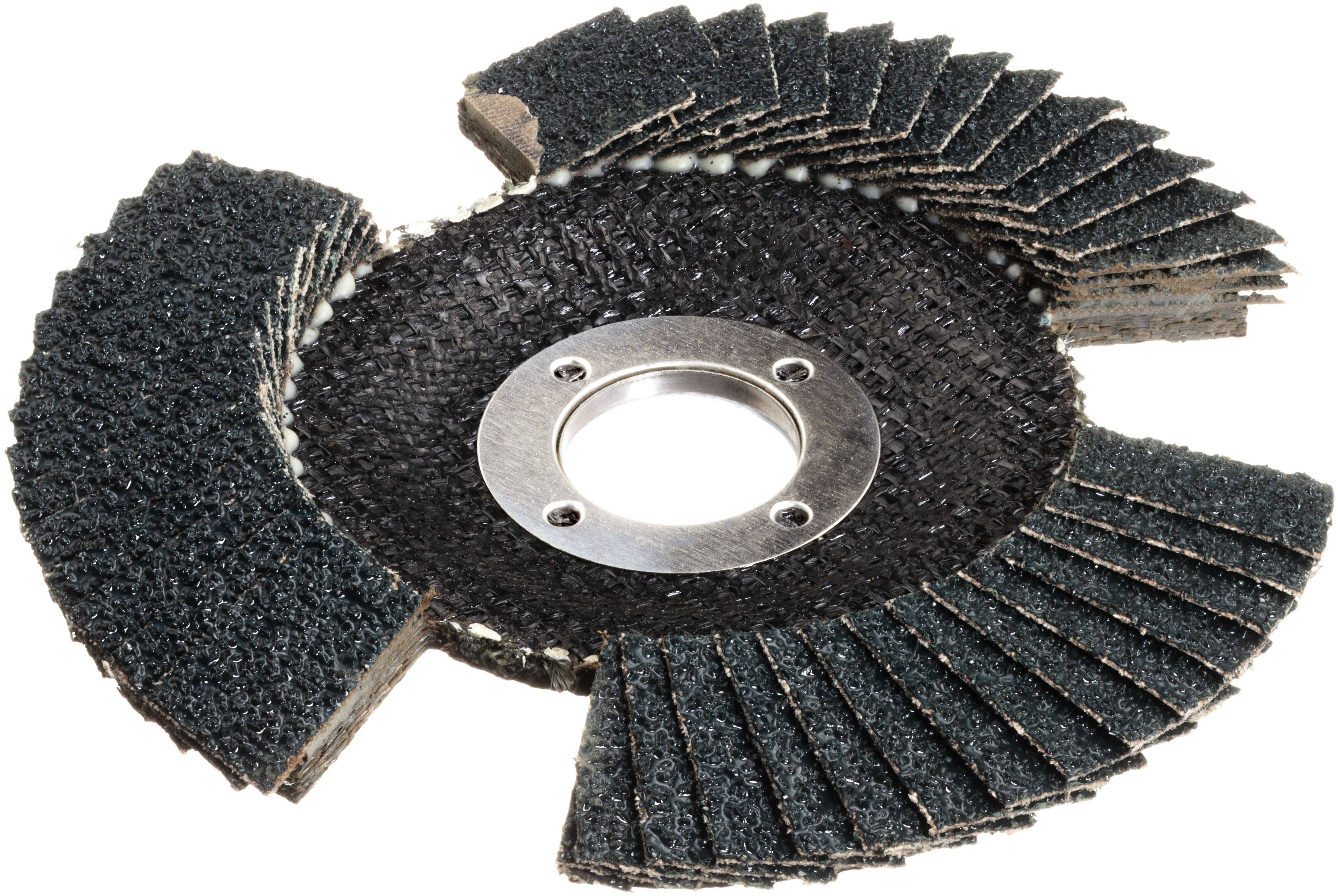 A circular abrasive flap disc with overlapping layers of sandpaper, used for grinding and finishing surfaces, on a white background.