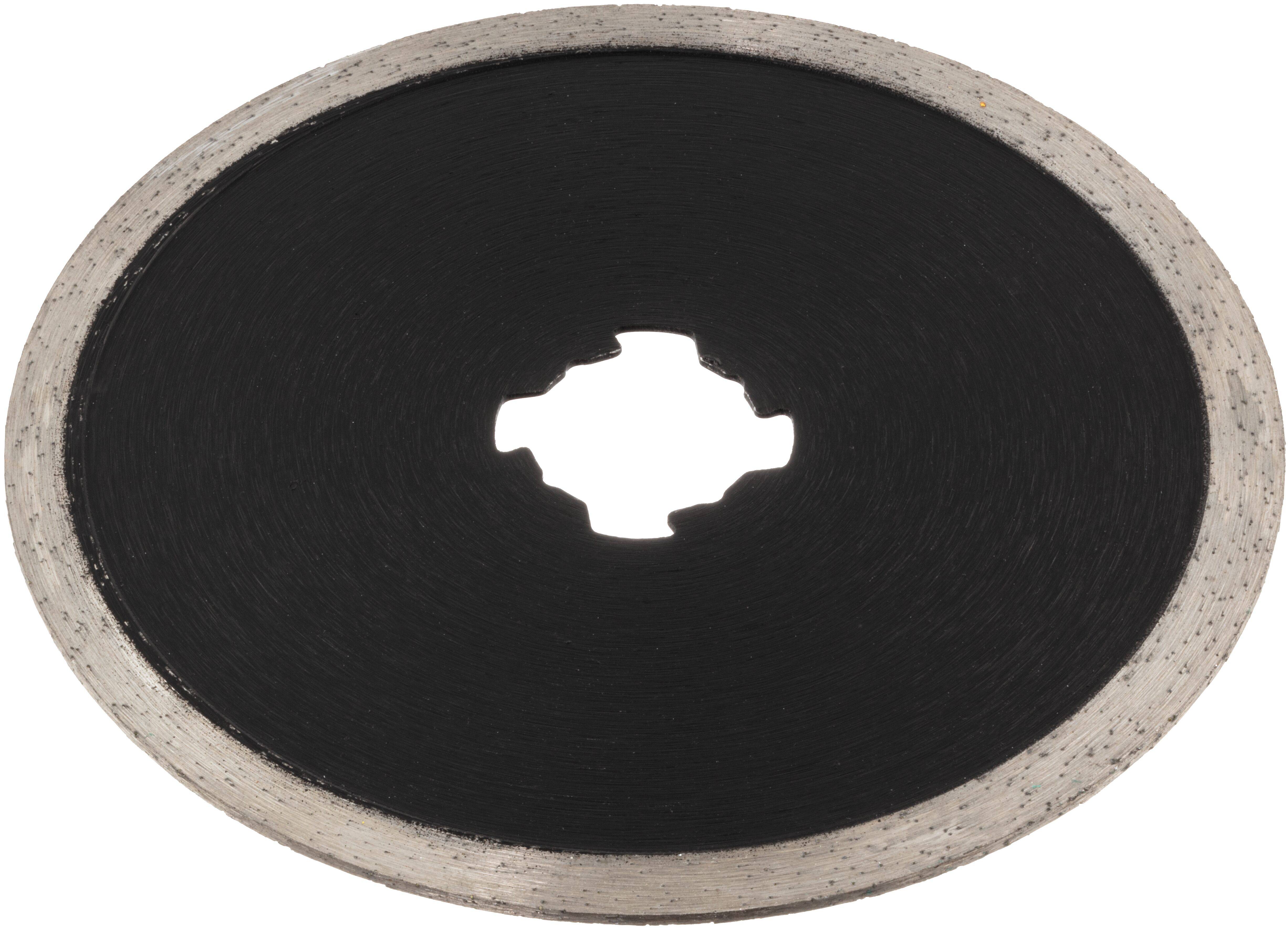 A circular, black saw blade with a silver rim and a central hole with notches, used for cutting materials.