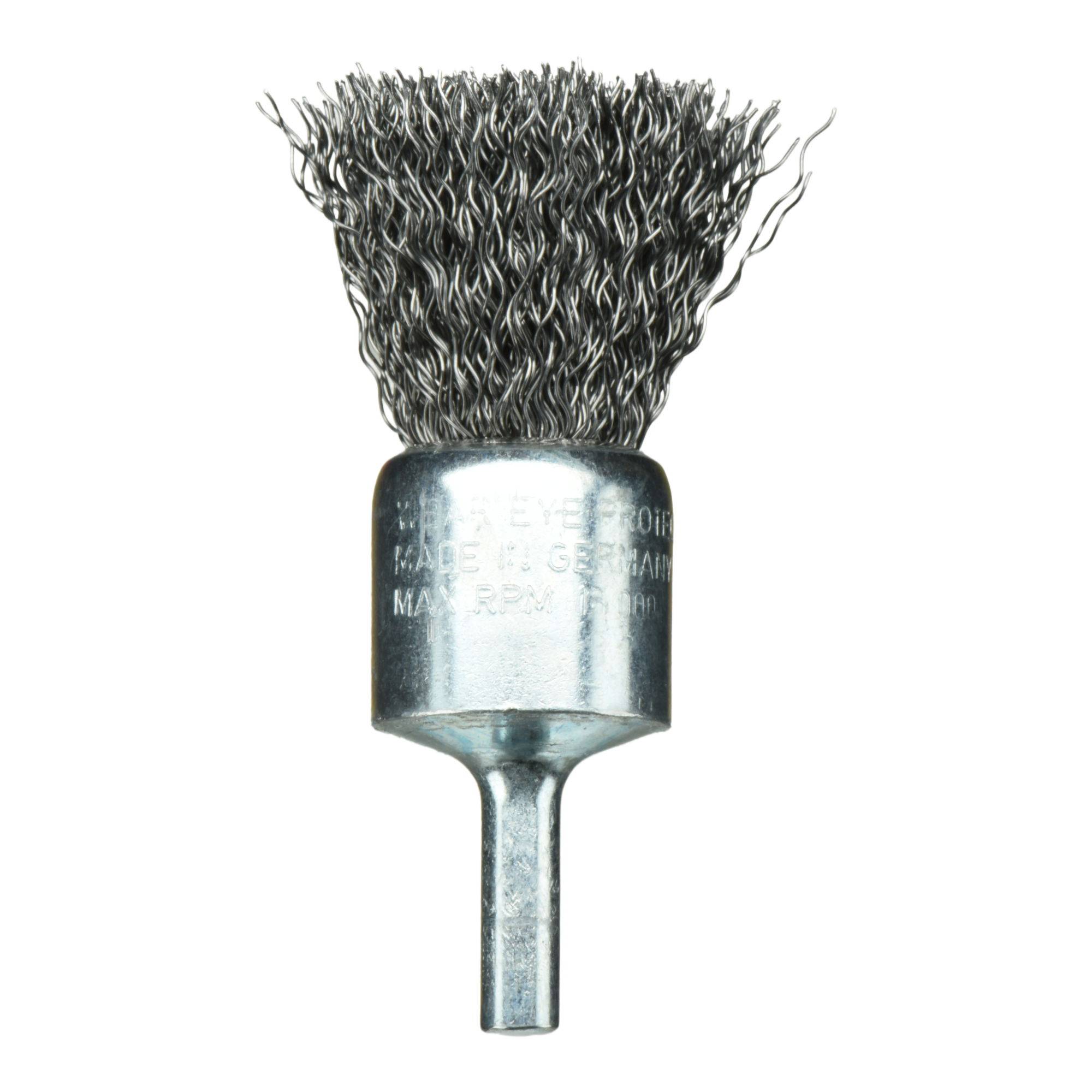 A metal wire cup brush with a cylindrical handle, used for cleaning and polishing surfaces, made in Germany.