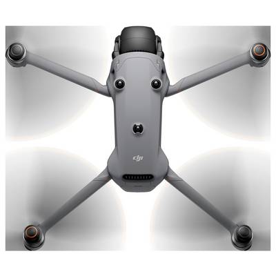 A quadcopter drone shown from above, highlighting its four extended propeller arms and central body with lens-like features.
