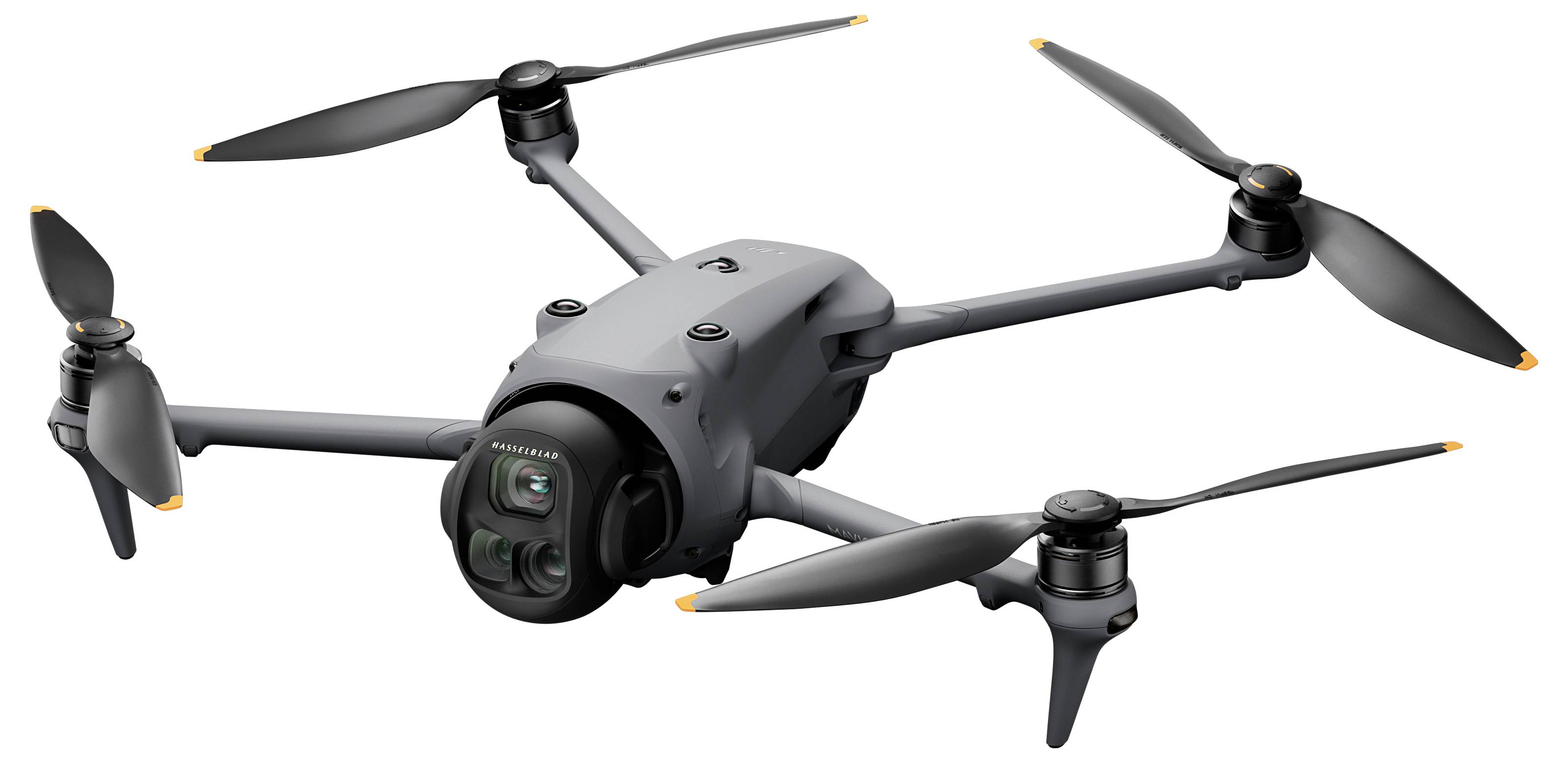A gray quadcopter drone with four propellers is shown, featuring a camera on the front, designed for aerial photography and videography.