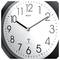 Analog wall clock with black numbers and hands, showing the time as 10:10. The brand name 'Mebus' is visible on the clock face.