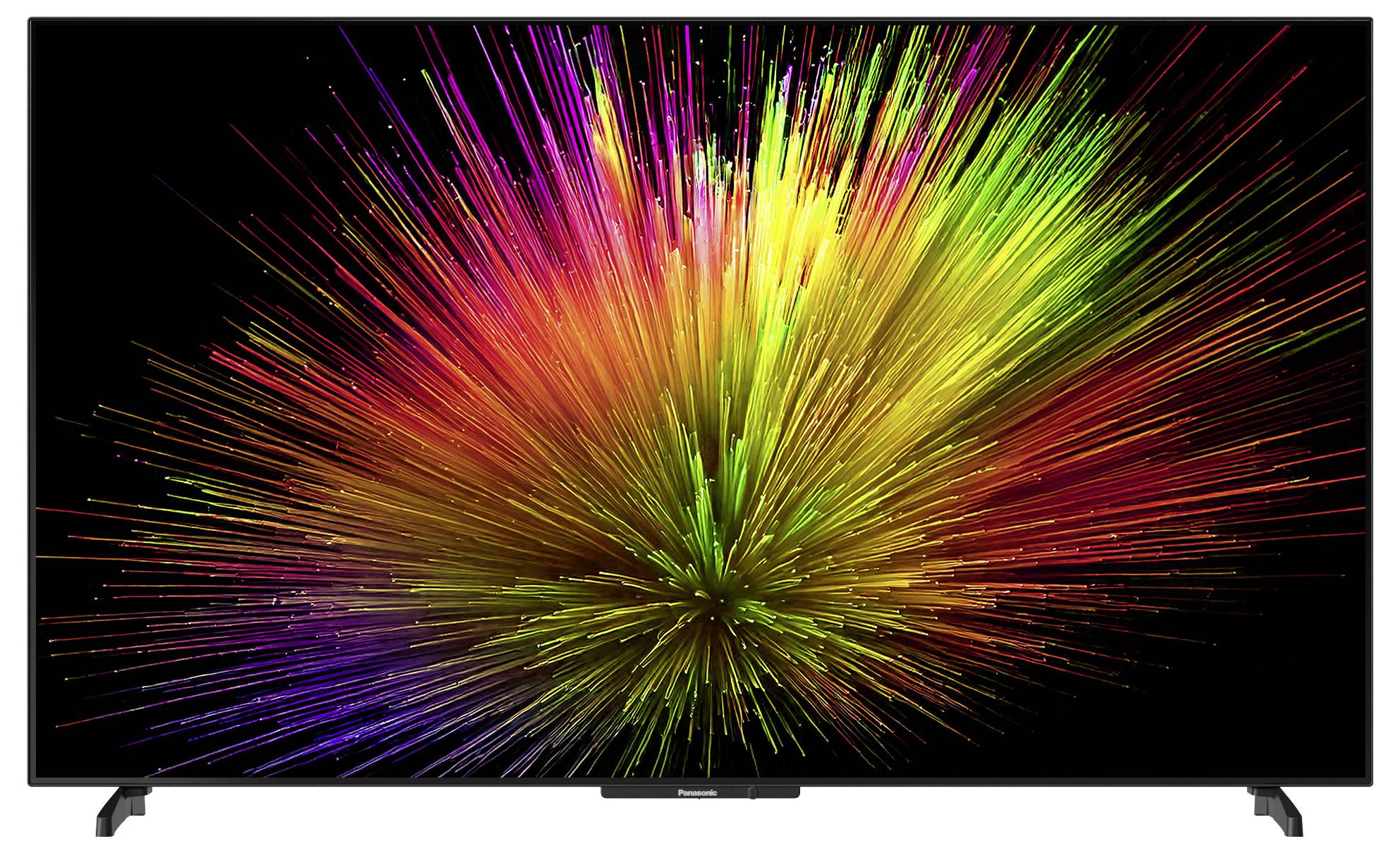 A burst of vibrant, multicolored light streaks against a black background, resembling an explosion of fireworks or a starburst pattern.