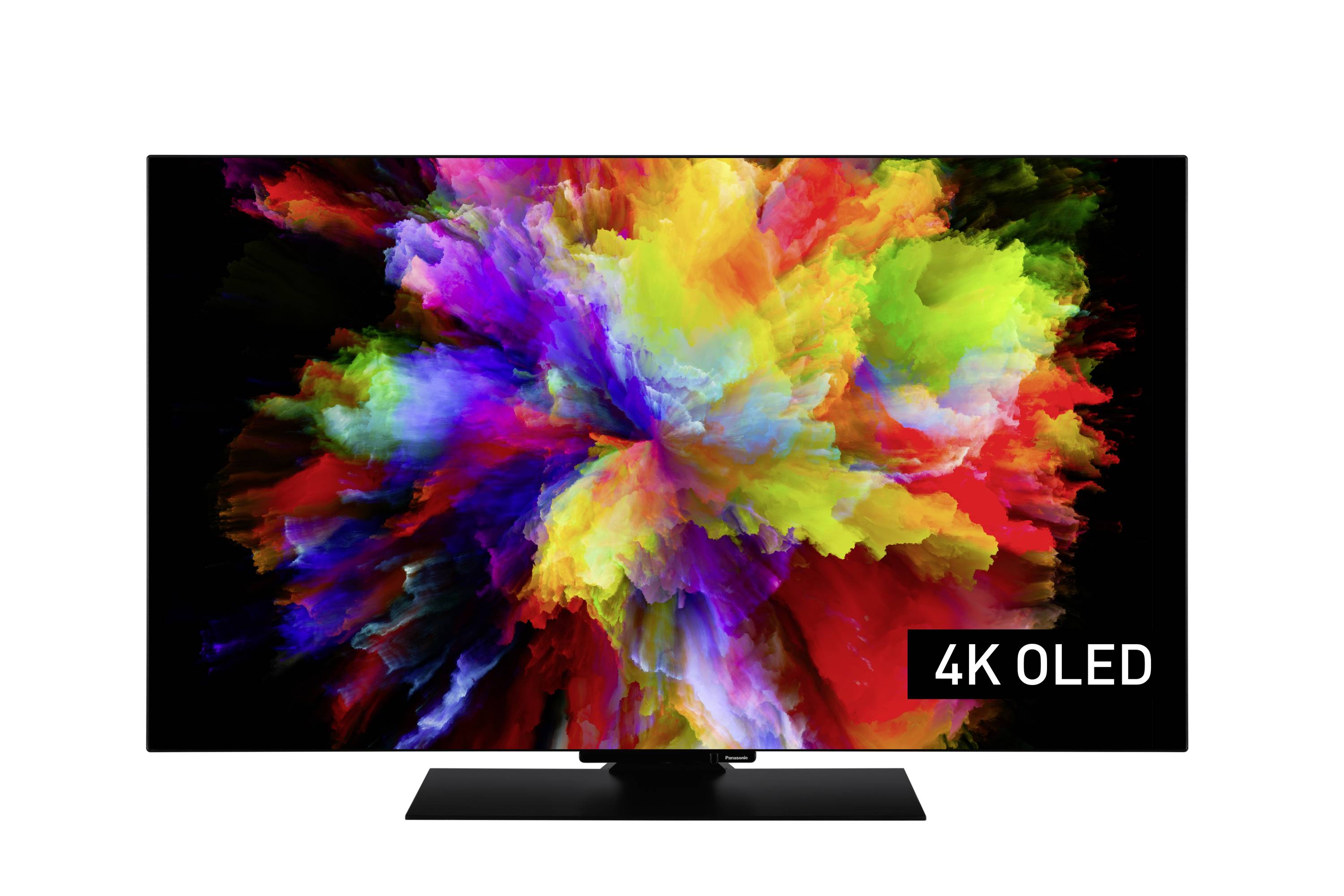 A television screen displaying a vibrant explosion of colorful particles on a black background with '4K OLED' text in the corner.