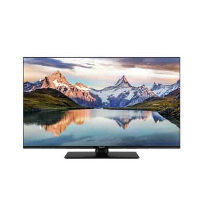 The image shows the back view of a black flat-screen television with its stand attached.