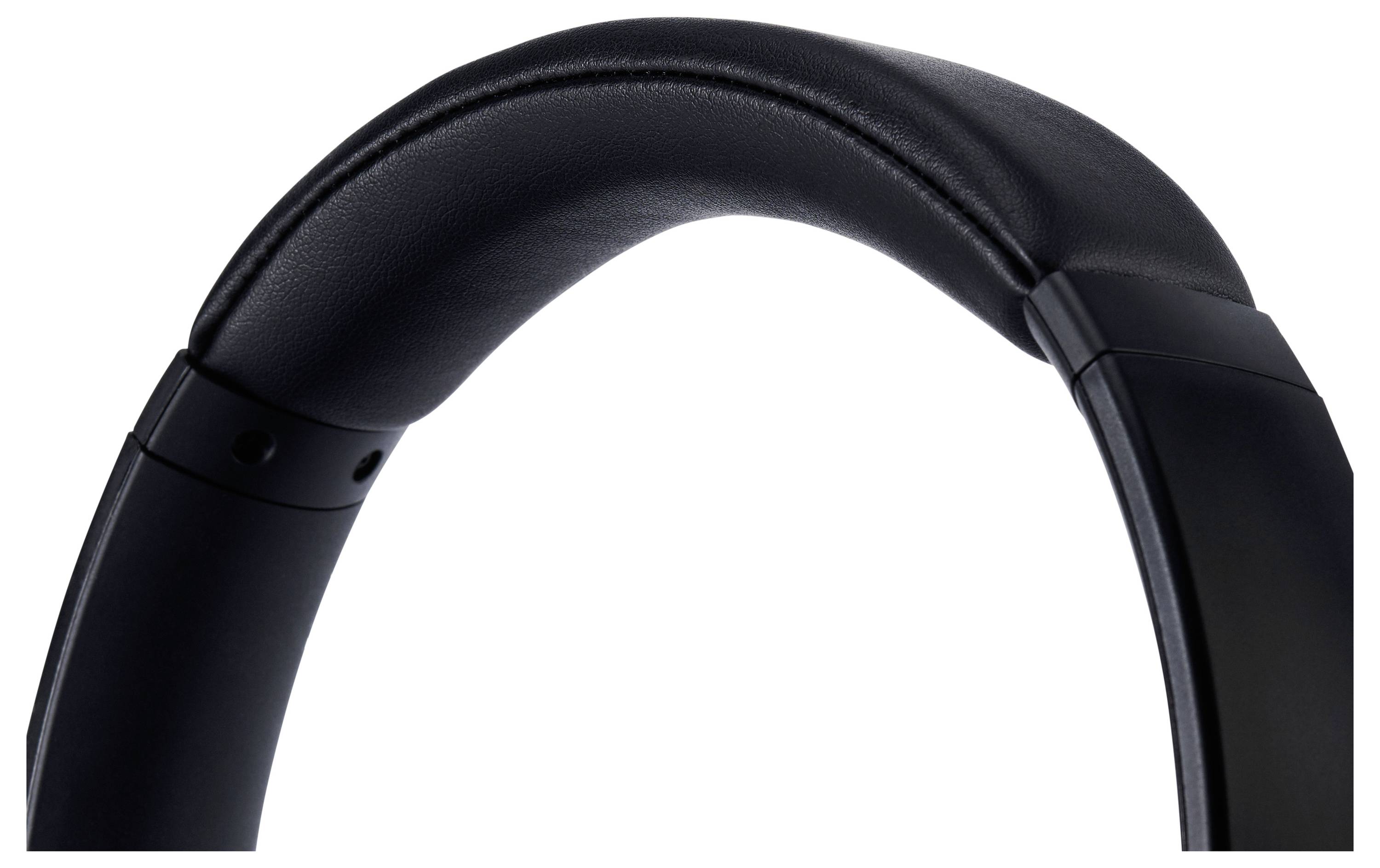 Black over-ear headphone headband in close-up view, showing the cushion and hinges.