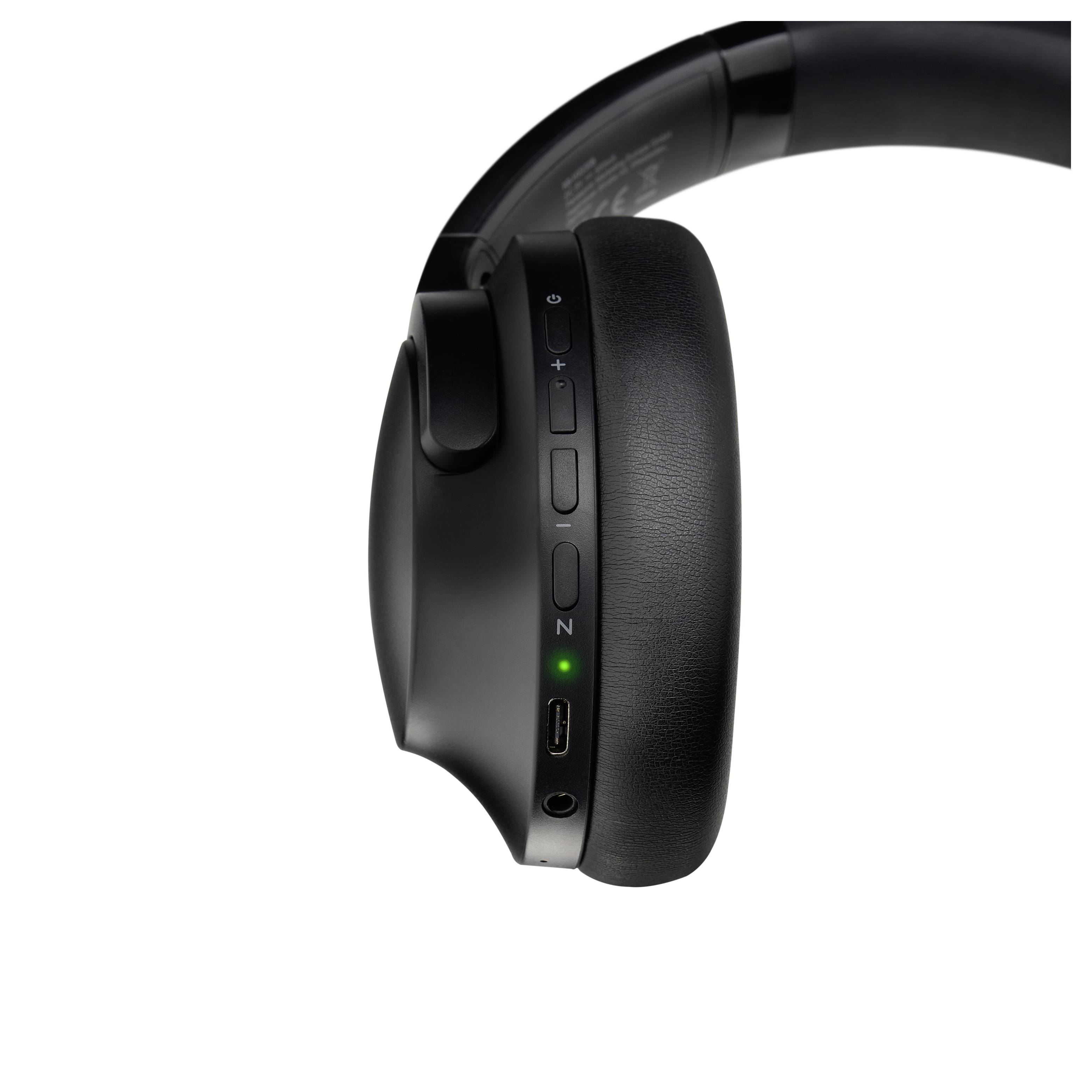 Black over-ear headphones showing volume control, noise-canceling switch, and charging port on the right ear cup.