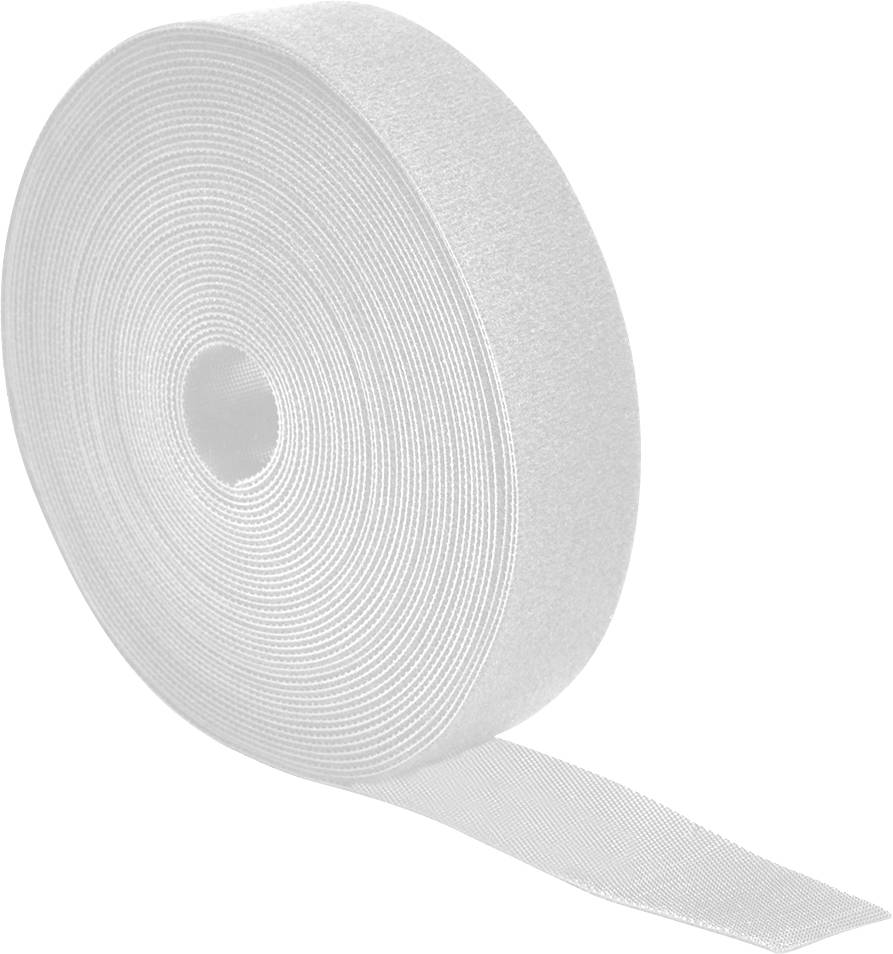 A white roll of hook-and-loop fastener tape is partially unrolled, with a textured surface visible.